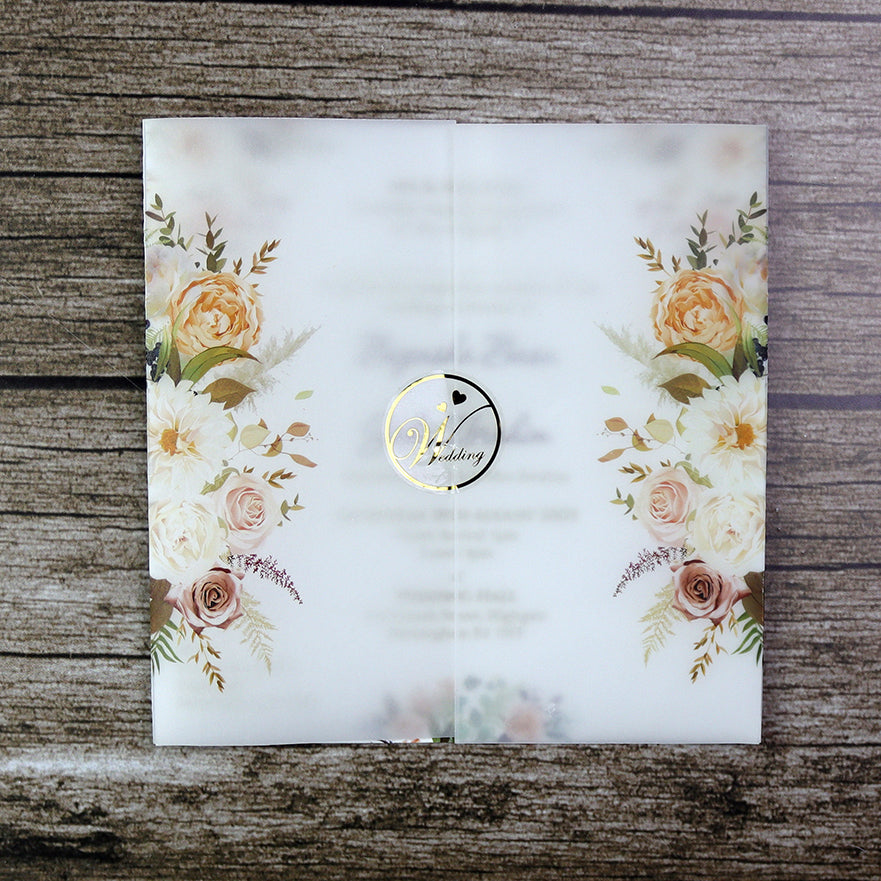 Front-on view of a square gatefold invitation of a floral vellum invite with yellow, maroon and white flowers