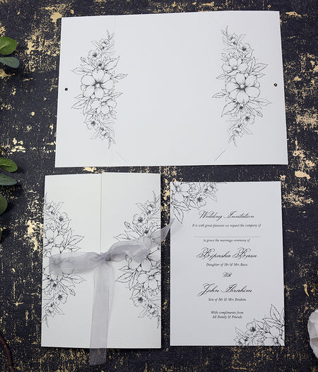 Black line drawn flowers invitation with silver ribbon