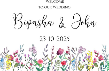 Artistic watercolor welcome sign with bright multicolor floral elements.