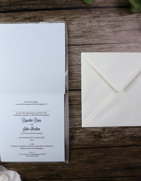 2006 silver floral Baby Blue bow Vellum overlay wedding invitation