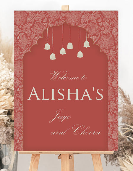 
A1 personalised portrait Wedding welcome poster mounted on board can be placed 
on easel with arch in red colour with some bells hanging 
from top and sides are covered in floral pattern