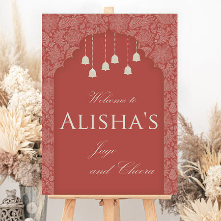 
A1 personalised portrait Wedding welcome poster mounted on board can be placed 
on easel with arch in red colour with some bells hanging 
from top and sides are covered in floral pattern