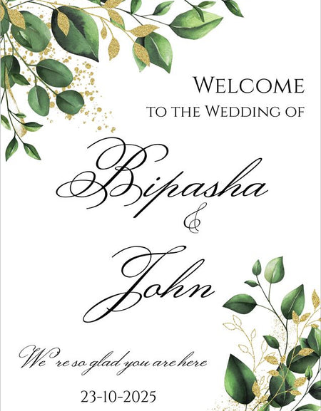 Personalized wedding welcome board with elegant greenery accents