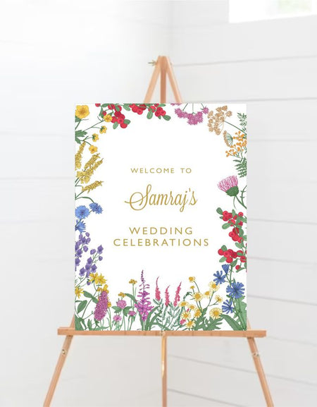 Floral-themed wedding welcome board in portrait layout with bright watercolor flowers from Shadi card.com