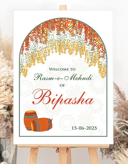 Custom wedding entrance sign with colorful floral accents and traditional dholkis