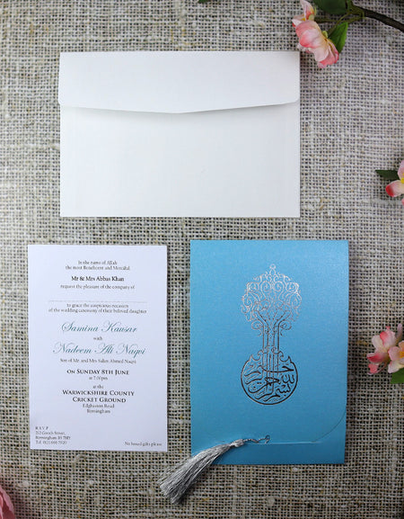 Close-up detail of ABC 539 Invitation, highlighting the silver foiled Arabic calligraphy of 'Bismillah,' symbolizing divine grace and blessings.