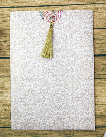 traditional wedding invitations in ivory with gold tassel which is a simple pocket wedding invitation