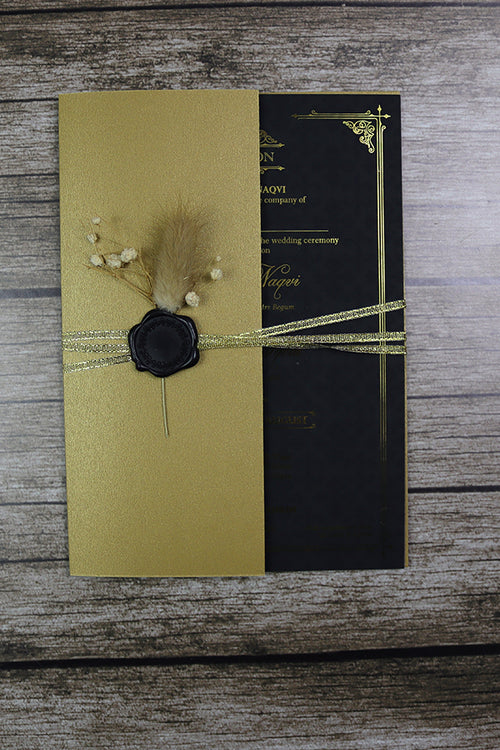 Load image into Gallery viewer, Luxury gold foil wedding invitation A5 black with wax seal, dried flowers, string tie and light gold envelope
