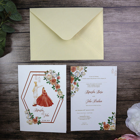 Traditional Indian wedding invitation with image of Desi Bride and Groom and peach coloured roses border