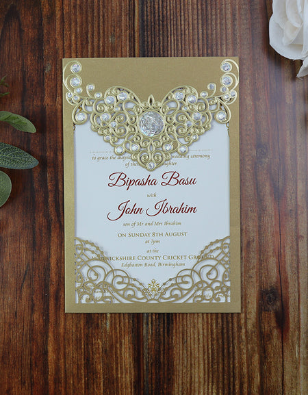 Close-up of the Gold Laser Cut Necklace Pocket Invitation LC 6076, showcasing the intricate embossed floral pattern and gold foiled accents.