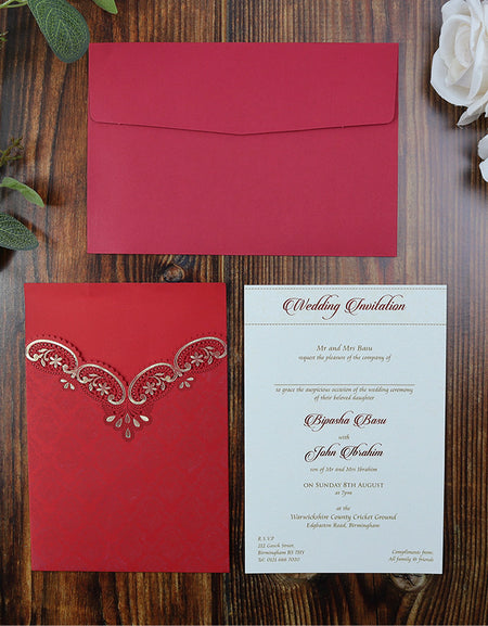 Open view of the Lasercut Pocket invitation for wedding in red. Multiple inserts can be added to this laser cut
wedding card invitation