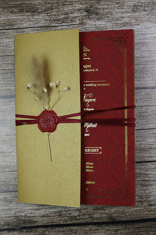 Load image into Gallery viewer, Luxury gold foil wedding invitation A5 red with wax seal, dried flowers, string tie and light gold envelope
