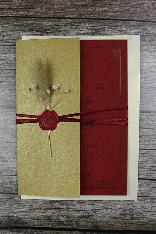 Load image into Gallery viewer, Luxury gold foil wedding invitation A5 red with wax seal, dried flowers, string tie and light gold envelope
