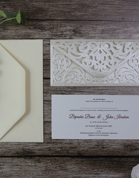 Opened up view of the Ivory pearlescent card laser cut design pocket invitation