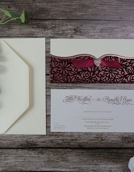 Open view of SC 5464 Maroon Floral Velvet Pocket Invitation, revealing a landscape design with a maroon floral pattern, velvet texture, and a pocket holding event details, complemented by a maroon ribbon for added opulence shadi card.com