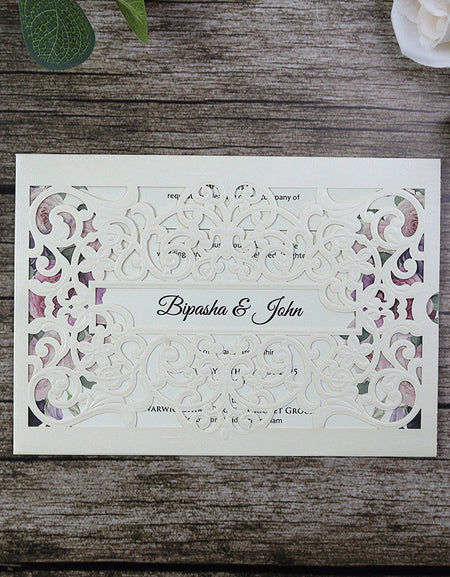 Close-up of SC 5537 Regal Vines Laser Cut Pocket Invitation, showcasing the intricate vine and floral laser-cut design.