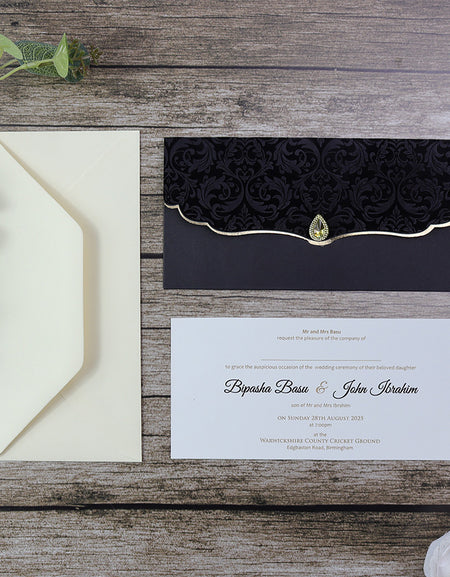 Elegant Black Velvet Wedding Invitation SC 5567 with gold trim and intricate floral velvet pattern as parekhcards.com