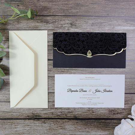 Elegant Black Velvet Wedding Invitation SC 5567 with gold trim and intricate floral velvet pattern as parekhcards.com