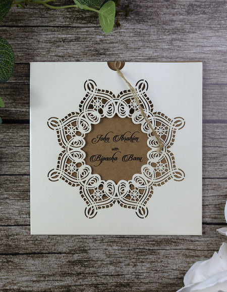 Close-up of SC 5621 Vintage Lace Pocket Invitation, highlighting the intricate laser-cut lace detailing.