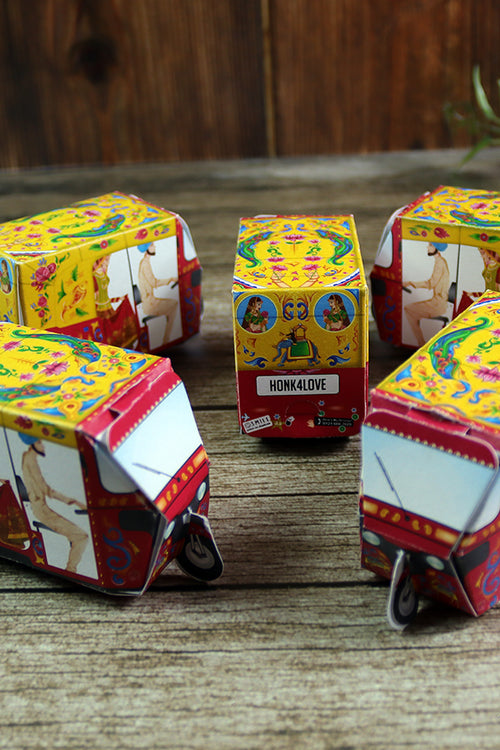 Load image into Gallery viewer, Rickshaw Tuktuk Shaped Favour Boxes Yellow &amp; Red – Flat Pack, Fill &amp; Assemble
