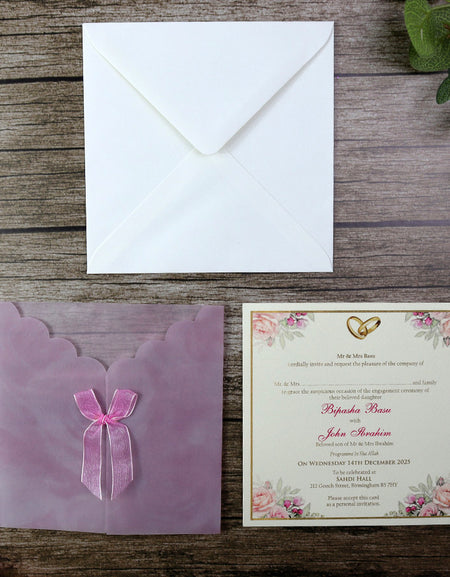 Close-up detail of W114E Pink Vellum Invitation, highlighting the translucent paper and soft pink hue, adding a delicate and romantic touch to the design shaadi cards Birmingham