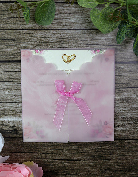 ront view of W114E Pink Vellum Translucent Paper Invitation, showcasing a soft pink vellum overlay with a delicate and elegant design, perfect for weddings and formal events wedding card printing
