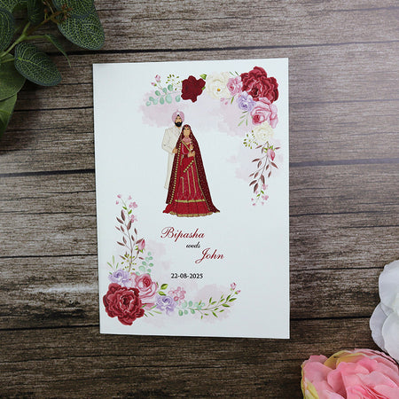Sikh couple Invitation in traditional clothing with Sherwani and red dress