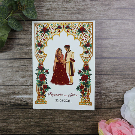 Desi Indian Pakistani couple in traditional attire wedding invitation card with red roses design