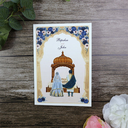 Blue Floral Anand Karaj Invitation with Standing Sikh Couple