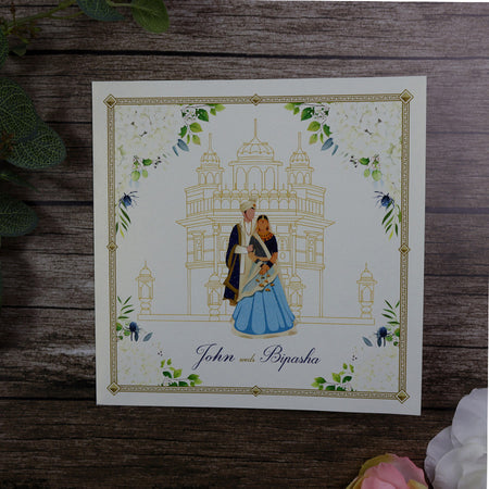 Sikh wedding invitation with whie flowers and Gurdwara
