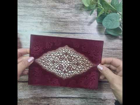 Load and play video in Gallery viewer, Elegant Regal Red Velvet Wedding Invitation SC 5568 showcasing debossed design, laser cut edges, and tassel accent in landscape format
