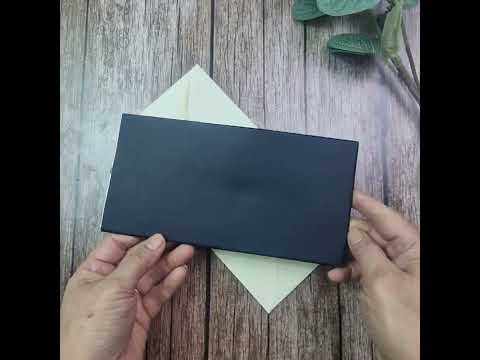 Load and play video in Gallery viewer, Regal Black and gold Velvet Pocket Invitation with Tassle SC 5626
