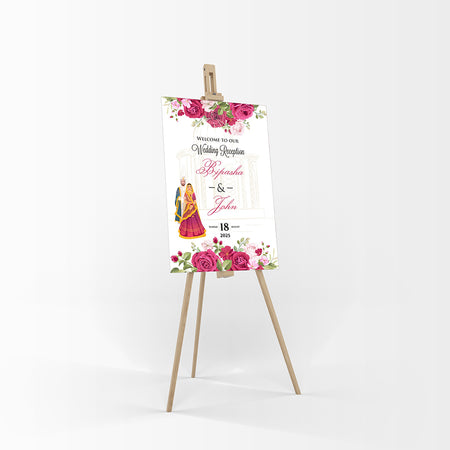 A mounted welcome poster featuring a floral design with the numbers '1078' prominently displayed, presented on a wooden easel.