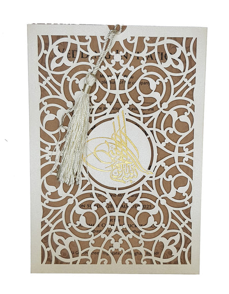 Front view of SC 2670 Ivory Laser Cut Pocket Bismillah Invitation, showcasing intricate laser-cut patterns with gold foiled Arabic 'Bismillah' calligraphy and a decorative tassel