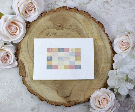Ivory wedding invitation with pastel square centre panel and gold foiled text
