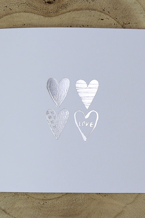 Load image into Gallery viewer, Open view of 5068 Invitation, highlighting the four uniquely filled silver hearts and minimalist design, perfect for budget-friendly weddings
