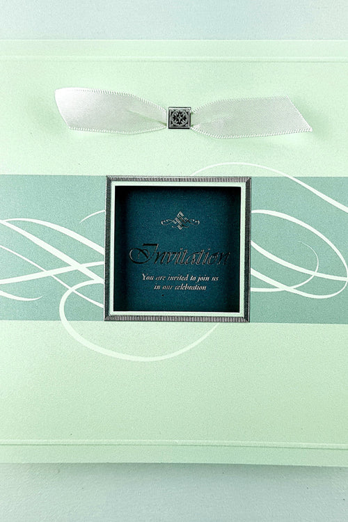 Load image into Gallery viewer, Close-up detail of 7006 Invitation, highlighting the square window cutout and shimmering pearlescent cardstock, adding a touch of sophistication and charm to the design
