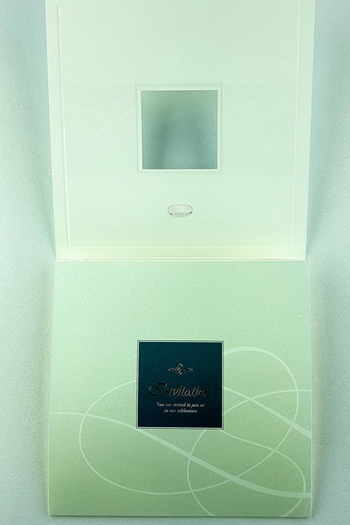 Load image into Gallery viewer, Close-up of 7006 Invitation, showcasing the shimmering pearlescent cardstock in varying shades of blue, creating a dazzling and luxurious effect.

