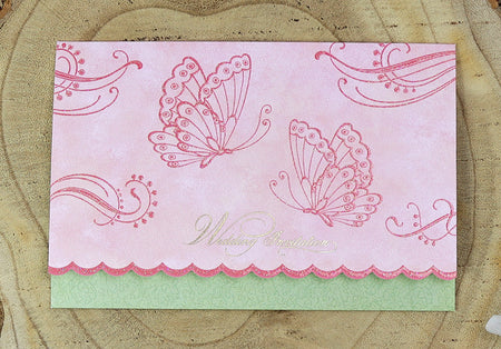 Single fold wedding card with dark pink butterflies on light pink background