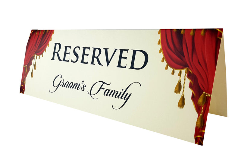 Luxurious red velvet curtain reserved table card with gold tassels saddi cards.com