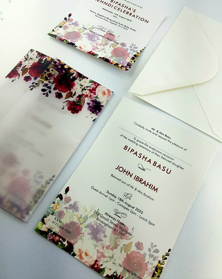 Front view of ABC 973 Translucent Maroon Roses Vellum Jacket Wrap Invitation, showcasing a luxurious maroon rose pattern on a translucent vellum overlay, creating an elegant and romantic design for wedding cards in Birmingham