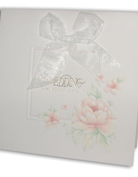 Folded wedding invitation BW16 displayed with sheer white bow at the top