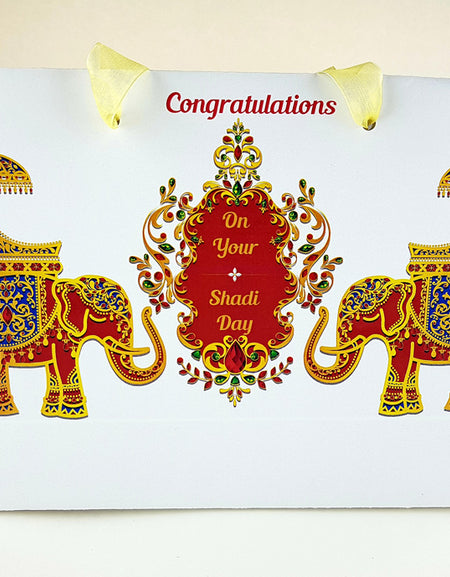 Front view of Personalized Mughal Royal Gift Bag 101 featuring regal elephants and a traditional Indian royal emblem from shaddi cards