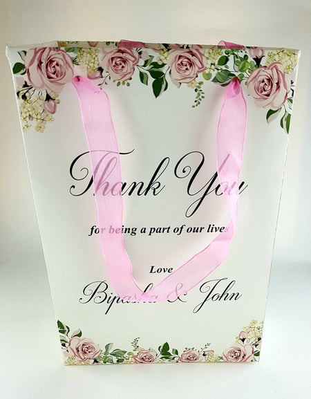 Side view of the custom floral gift bag showcasing its high-quality cardstock material and elegant finish