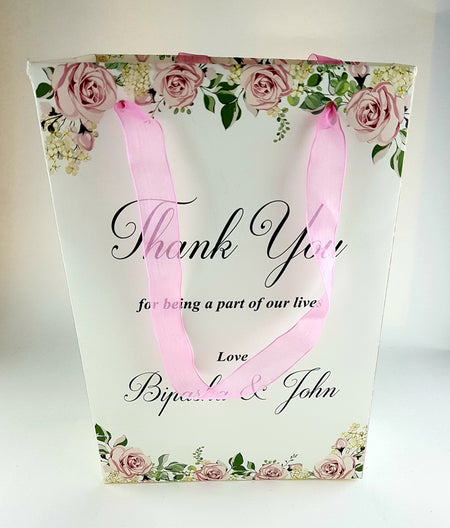 Side view of the custom floral gift bag showcasing its high-quality cardstock material and elegant finish