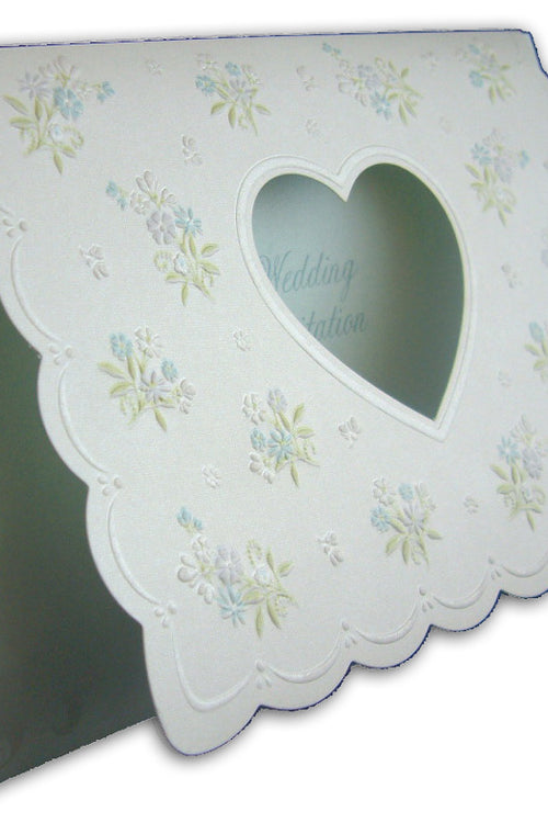 Load image into Gallery viewer, Close-up of the first fold of 7121 Invitation, showcasing small bouquets of green and pink embossed flowers, adding a touch of romance and sophistication to the design.
