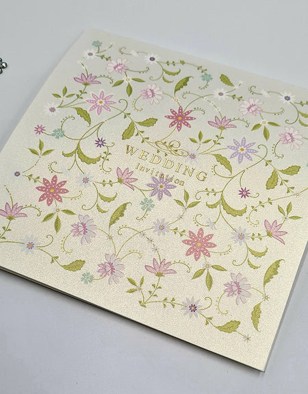 Square single fold floral wedding card with gold foiled text