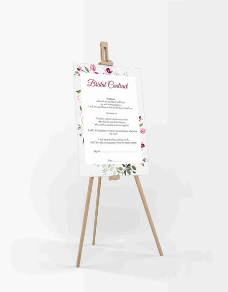 Side-on view of the funny marriage contract for husband with a floral pink and green design