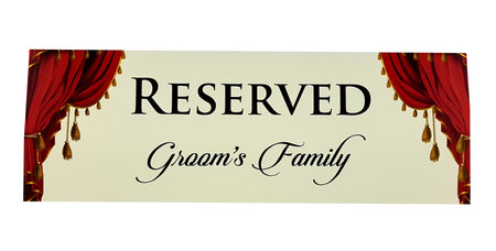 Elegant wedding table reserved sign with regal red drapery shaddi cards.com
