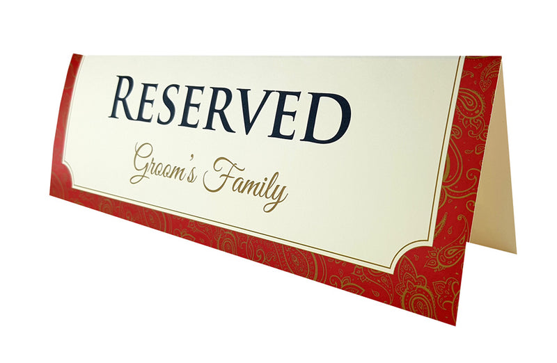 Red border table reserved card with gold and black elegant text by shaddi cards.com